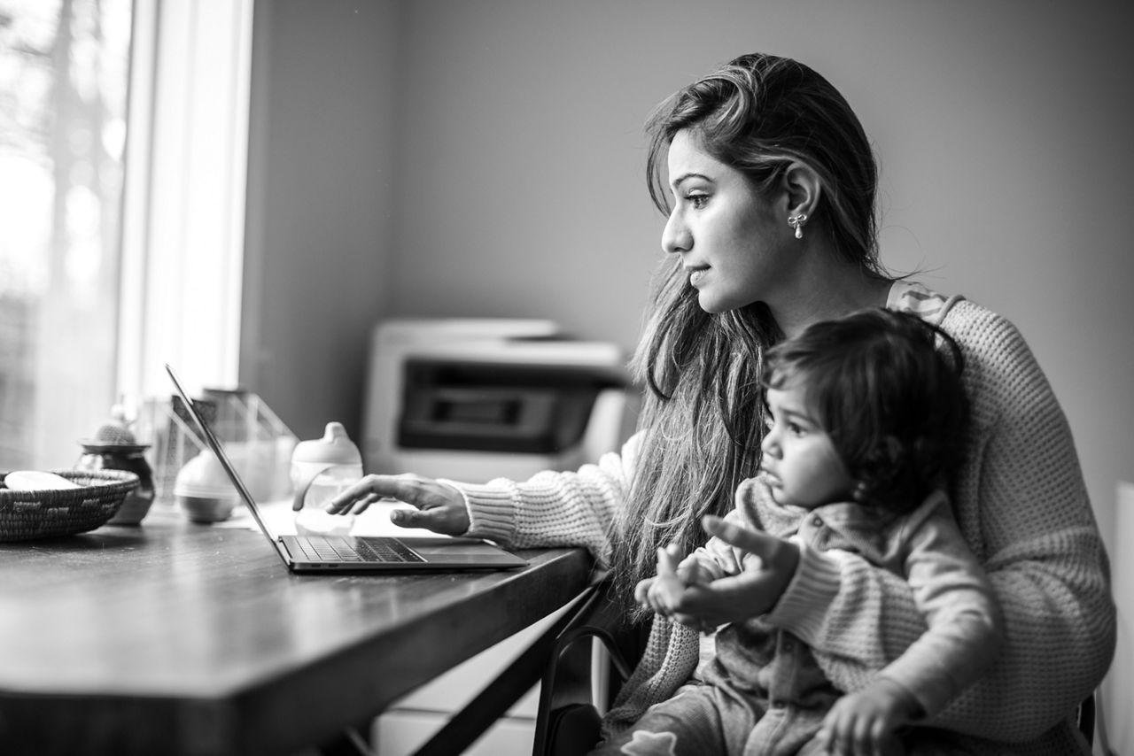 A parent at home with her child